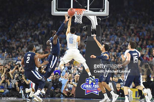 Marcus Paige of the North Carolina Tar Heels drives to the basket during the NCAA College Basketball Tournament Championship game against the...