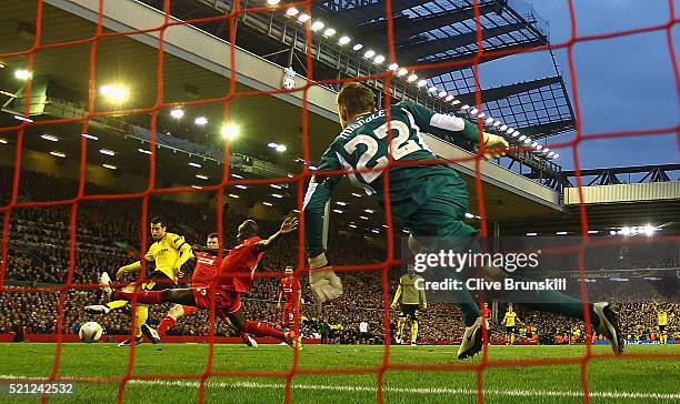 Henrikh Mkhitaryan of Borussia Dortmund scores his teams first goal during the UEFA Europa League quarter final second leg match between Liverpool...