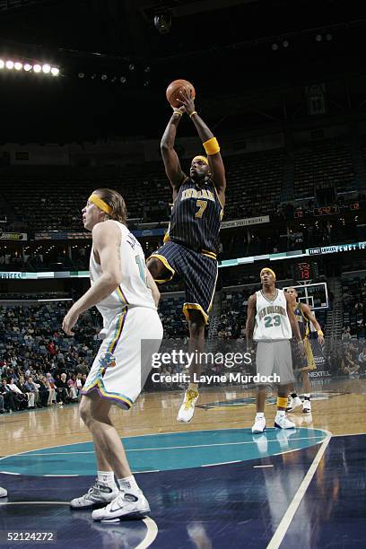 Jermaine O'Neal of the Indiana Pacers shoots during the game the New Orleans Hornets on January 19, 2005 at the New Orleans Arena in New Orleans,...
