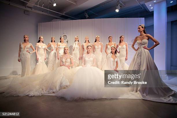 Models pose during the Galia Lahav Bridal Fashion Week Spring/Summer 2017 presentation on April 14, 2016 in New York City.