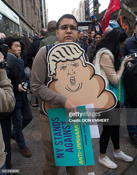 Protesters gather near Grand Central Station to protest against US Republican presidential candidate Donald Trump who was attending a New York GOP...