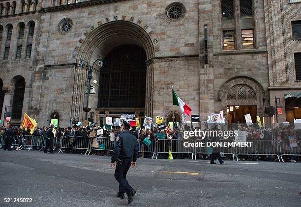 Protesters gather near Grand Central Station to protest against US Republican presidential candidate Donald Trump who was attending a New York GOP...