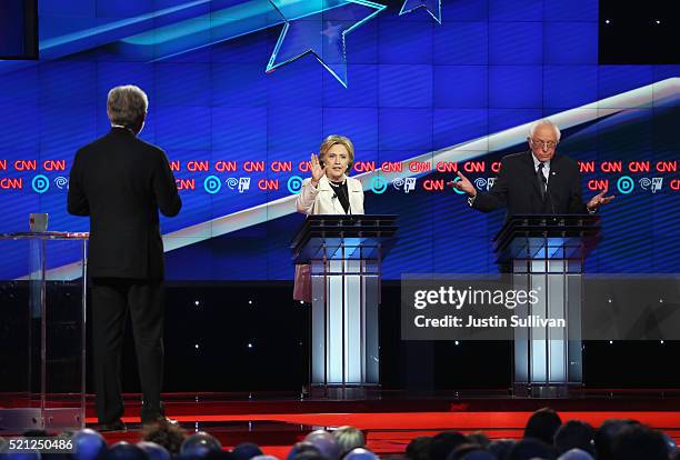 Democratic Presidential candidates Hillary Clinton and Sen. Bernie Sanders answer questions as Wolf Blitzer moderates during the CNN Democratic...