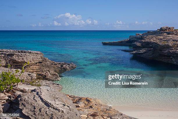 rocky reef on the ocean at providenciales, turks and caicos - providenciales stock pictures, royalty-free photos & images