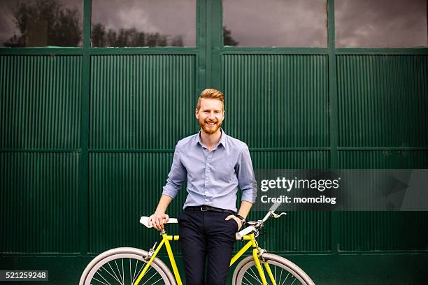 handsome male with modern bicycle - business man laughing stock pictures, royalty-free photos & images