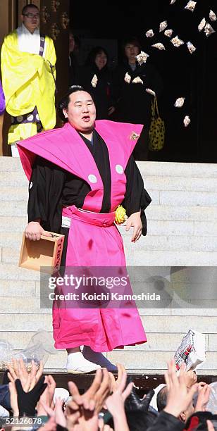 Grand champion Asashoryu throws beans at Shinshoji Temple to celebrate the coming of spring based on the lunar calender on February 3, 2005 in...