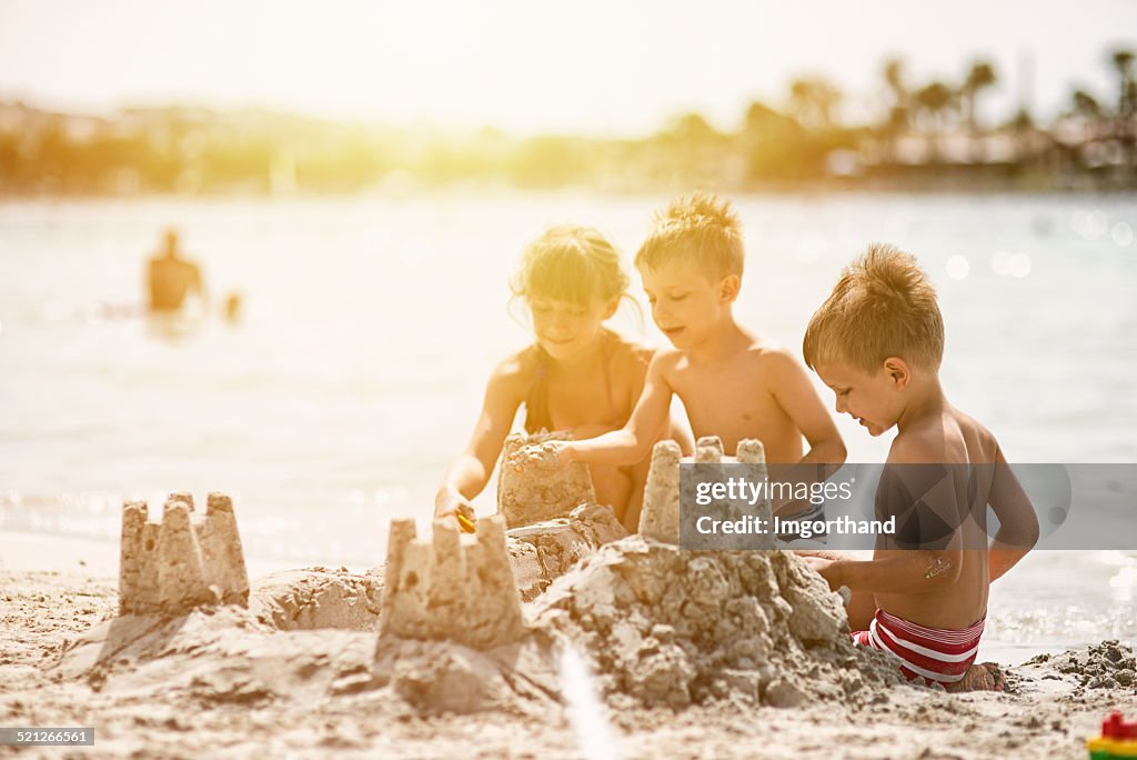 Kids building a sandcastle