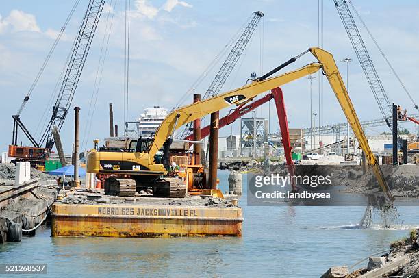 construcción del muelle de puerto cañaveral - draga fotografías e imágenes de stock