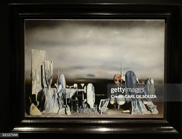 London, UNITED KINGDOM: A painting by Yves Tanguy, entitled "Les derniers jours" goes on display in Chrisities in London, 03 February 2005. The...