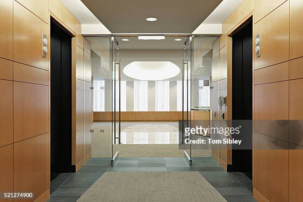 elevator lobby - office doorway stock pictures, royalty-free photos & images