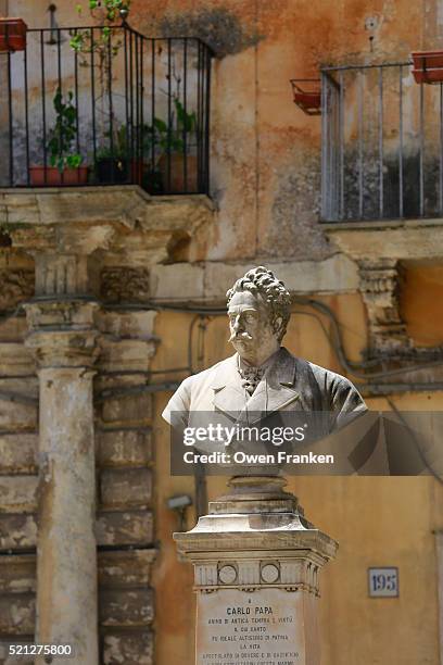 bust of carlo papa outside teatro garibaldi in modica, sicily, italy - modica sicily stock pictures, royalty-free photos & images