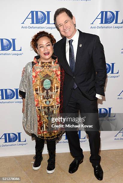 Producer Miky Lee and honoree Ken Solomon attend the ADL Entertainment Industry Dinner at The Beverly Hilton Hotel on April 14, 2016 in Beverly...