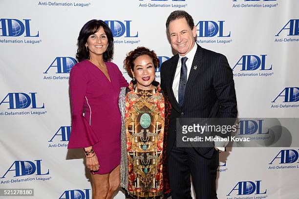 Lissa Solomon, Producer Miky Lee and honoree Ken Solomon attend the ADL Entertainment Industry Dinner at The Beverly Hilton Hotel on April 14, 2016...