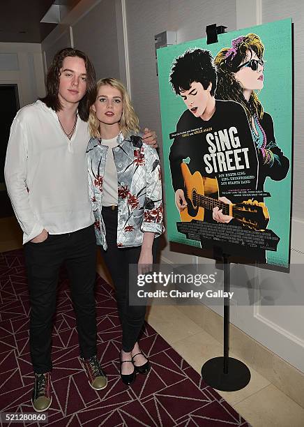 Actors Ferdia Walsh-Peelo and Lucy Boynton attend a special screening of "Sing Street" hosted by The Weinstein Company and Adam Levine at The London...