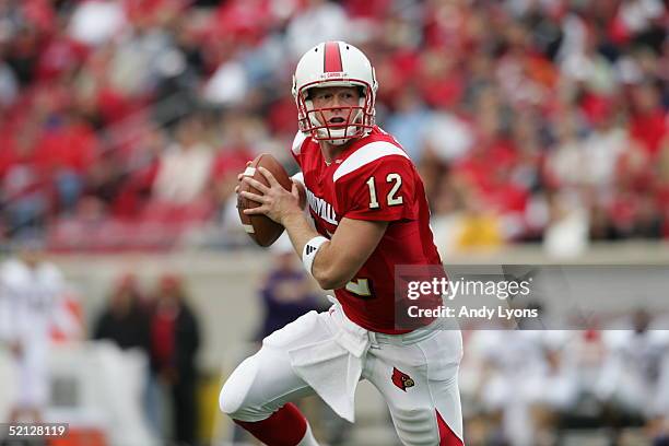 Brian Brohm of the Louisville Cardinals looks to pass during the game against the East Carolina Pirates at Papa John's Stadium on October 2, 2004 in...