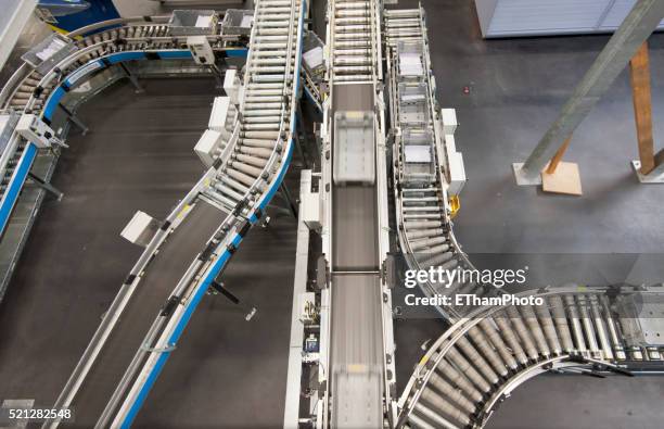 swiss postal service mail distribution center in zurich-mulligen - distribution center stockfoto's en -beelden