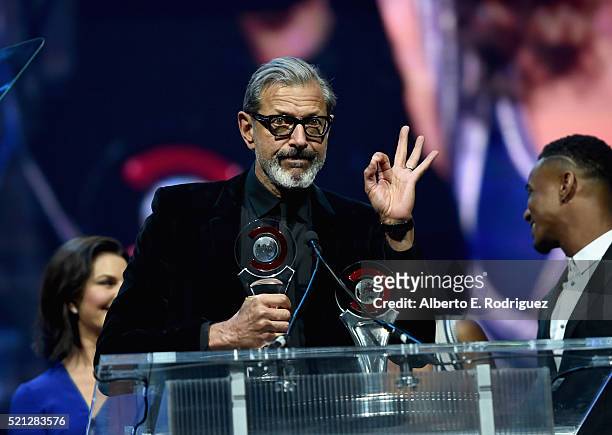 Actors Sela Ward, Jeff Goldblum and Jessie Usher accept the Ensemble of the Universe Award for "Independence Day: Resurgence" during the CinemaCon...