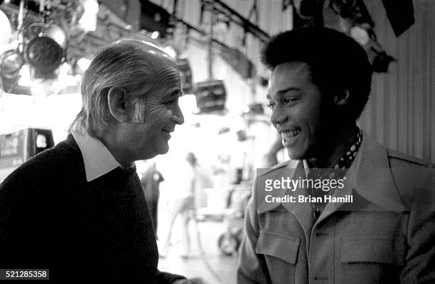 American television producer Norman Lear shares a laugh with actor Mike Evans on the set of their tv show 'The Jeffersons,' Los Angeles, California,...