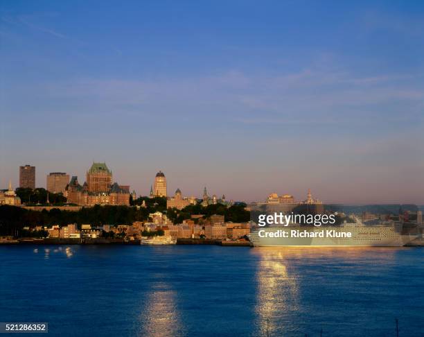 quebec skyline and royal princess cruise ship at sunrise - princess cruises stock pictures, royalty-free photos & images