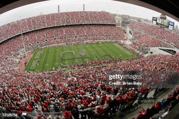 The Ohio State University Marching Band spells the word "Ohio" during an intermission in the game between the Ohio State University Buckeyes and the...