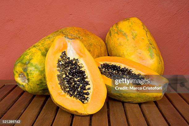 papaya fruit - papaya stock-fotos und bilder