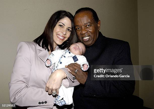 Singer Lou Rawls, his wife Nina Malek Inman and baby Aiden Allen Rawls attend the inaugural event of the Lou Rawls Center For The Perfoming Arts...