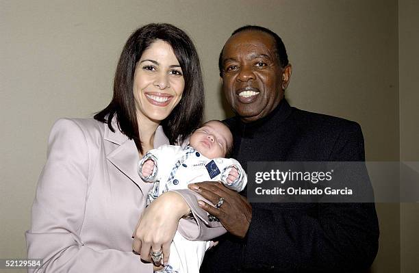 Singer Lou Rawls, his wife Nina Malek Inman and baby Aiden Allen Rawls attend the inaugural event of the Lou Rawls Center For The Perfoming Arts...