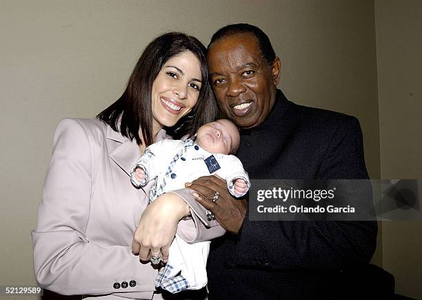 Singer Lou Rawls, his wife Nina Malek Inman and baby Aiden Allen Rawls attend the inaugural event of the Lou Rawls Center For The Perfoming Arts...