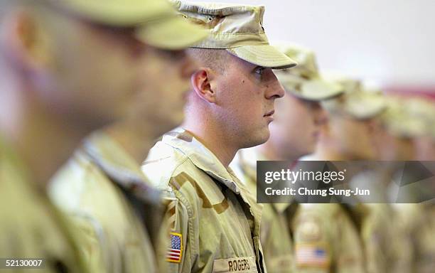 Soldiers who were part of a Task Force, deployed from South Korea to Iraq on October 2004, participate in a welcome home ceremony at U.S. Army Camp...