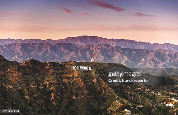 aerial view of the hollywood sign at dusk - hollywood californië stockfoto's en -beelden