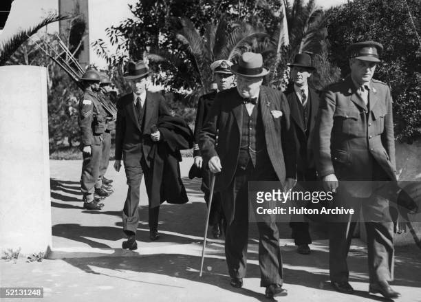 British Prime Minister Winston Churchill leaves his villa at Anfa, February 1943, after the Casablanca Conference at which it was decided to demand...