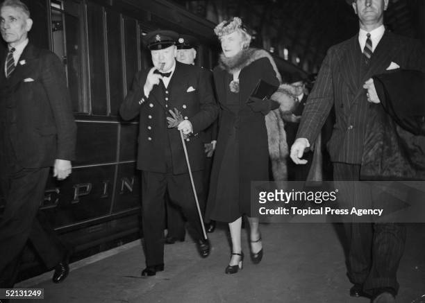 British Prime Minister Winston Churchill with his wife Clementine , Auafter his return from to London from his sea conference with President...