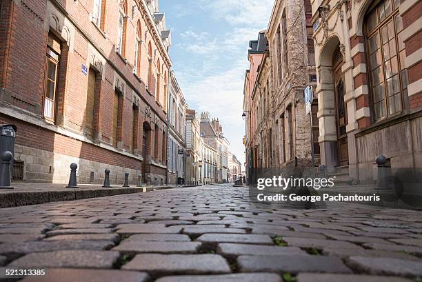 cobbled stone street in lille - lille france stock pictures, royalty-free photos & images