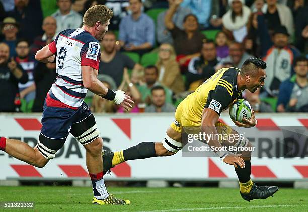 Victor Vito of the Hurricanes scores a try during the round eight Super Rugby match between the Rebels and the Hurricanes at AAMI Park on April 15,...