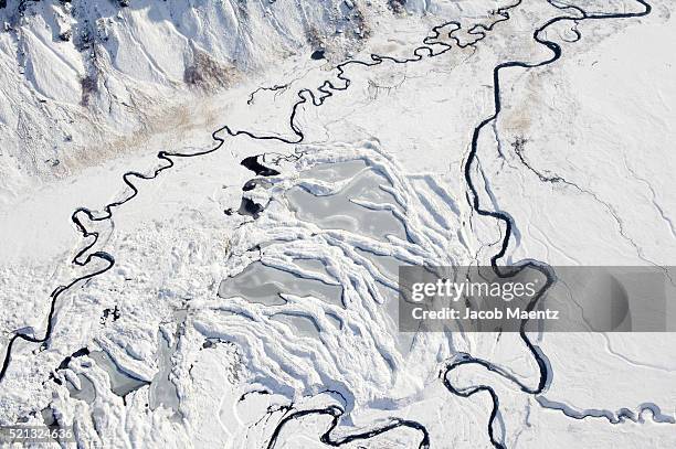 aerial - frozen bay in the aleutian islands - bering sea fotografías e imágenes de stock