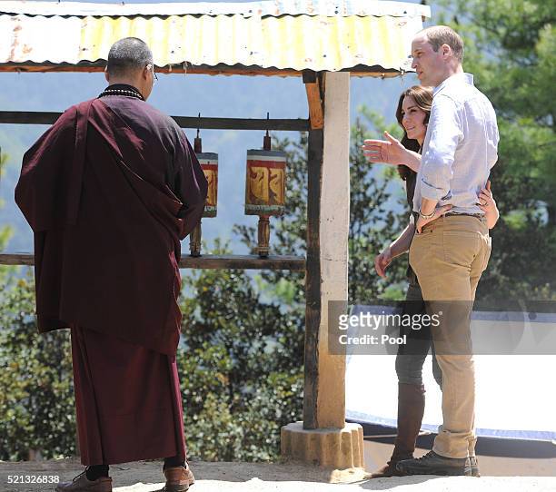 Prince William, Duke of Cambridge and Catherine, Duchess of Cambridge half way on their hike to Paro Taktsang, the Tiger's Nest monastery on April...