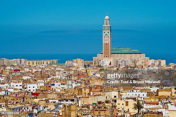 morocco, casablanca, old medina and hassan ii mosque - casablanca morocco stock pictures, royalty-free photos & images