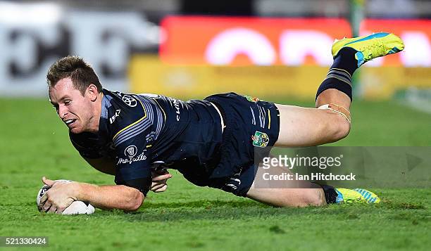 Michael Morgan of the Cowboys scores a try during the round seven NRL match between the North Queensland Cowboys and the South Sydney Rabbitohs at...