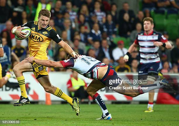 Beauden Barrett of the Hurricanes scores a try during the round eight Super Rugby match between the Rebels and the Hurricanes at AAMI Park on April...