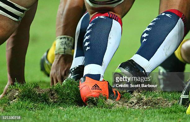 Large divots of turf are ripped up during a scrum during the round eight Super Rugby match between the Rebels and the Hurricanes at AAMI Park on...