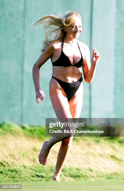 Woman Streaker at the Golf Open Tournament Jul 1999 who stripped down to her bra and knickers and ran onto the green at the 18th to meet and hug...