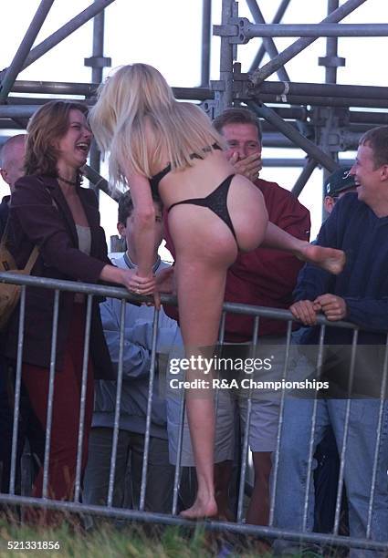 Woman Streaker at the Golf Open Tournament Jul 1999 who stripped down to her bra and knickers and ran onto the green at the 18th to meet and hug...