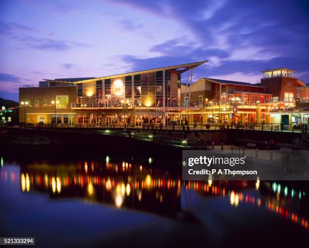 mermaid quay at night, cardiff, wales - cardiff wales stock pictures, royalty-free photos & images