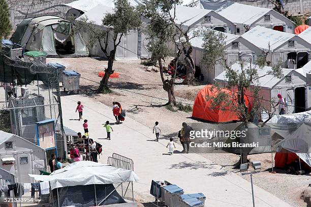 Tents surround the Moria refugee camp where asylum-seekers wander the complex on April 15, 2016 in Mytilini on Lesbos island in Greece. Pope Francis...