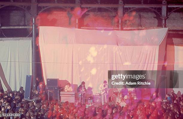 View from the back of the venue showing the crowd at the Roundhouse watching Pink Floyd perform, London, 31st December 1966.