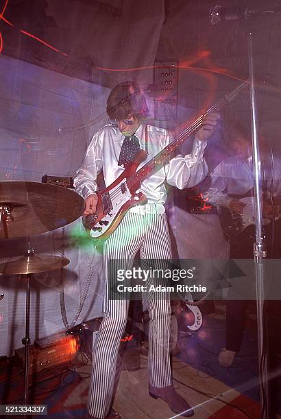 Roger Waters of Pink Floyd performs at the Architectural Association student party, London, 16th December 1966. He is playing a Rickenbacker 4001S...