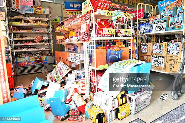 The items are left fallen off the shelf in a store a day after the 2016 Kumamoto Earthquake on April 15, 2016 in Mashiki, Kumamoto, Japan. As of...