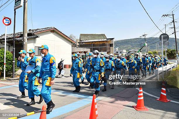 Group of rescue workers is seen a day after the 2016 Kumamoto Earthquake on April 15, 2016 in Mashiki, Kumamoto, Japan. As of April 15 morning, at...