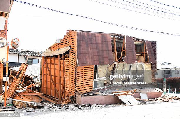 House is seen collapsed a day after the 2016 Kumamoto Earthquake on April 15, 2016 in Mashiki, Kumamoto, Japan. As of April 15 morning, at least nine...