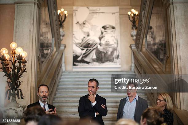 The director of Palazzo Grassi Martin Bethenod with Georg Polke and the two curators Elena Geuna and Guy Tosatto attend the press conference during...